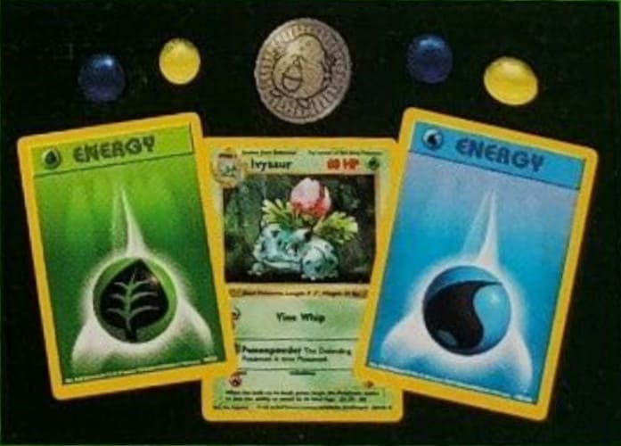 Middle card behind the two energy cards with damage counters